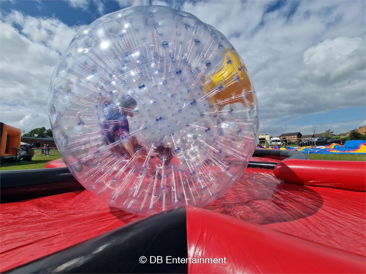 Zorbs with Kris Cross Track - Inflatable Funfair & Exhibition Game Hire ...
