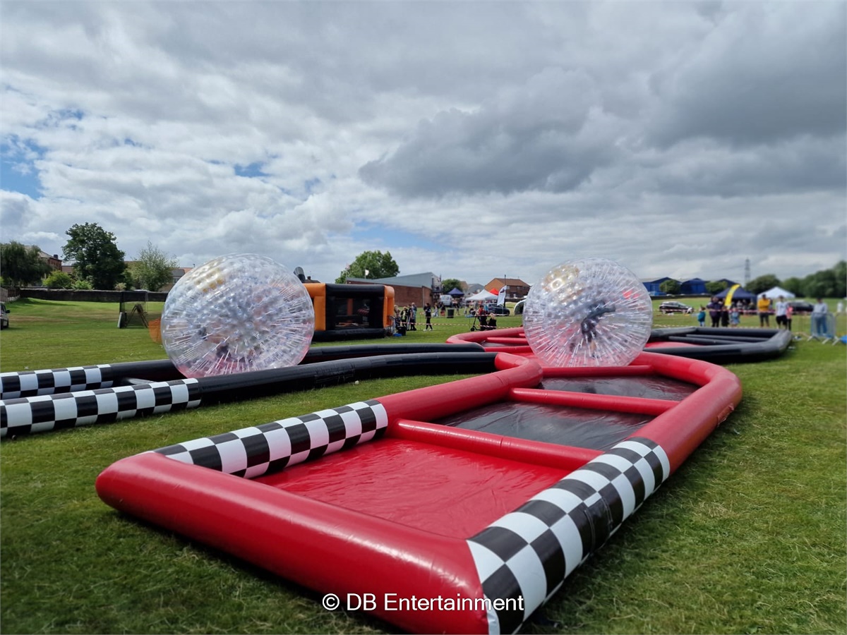 Zorbs with Kris Cross Track - Inflatable Funfair & Exhibition Game Hire ...
