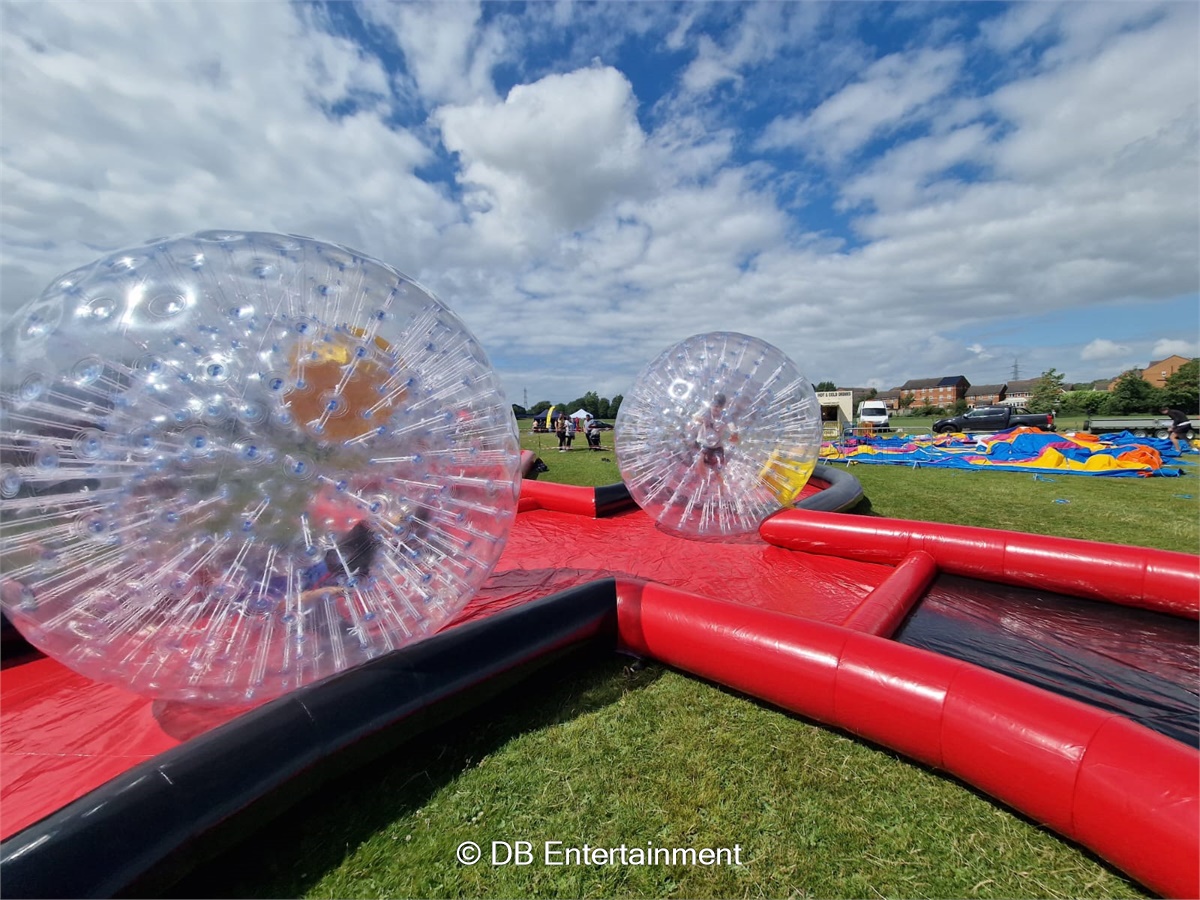 Zorbs with Kris Cross Track - Inflatable Funfair & Exhibition Game Hire ...