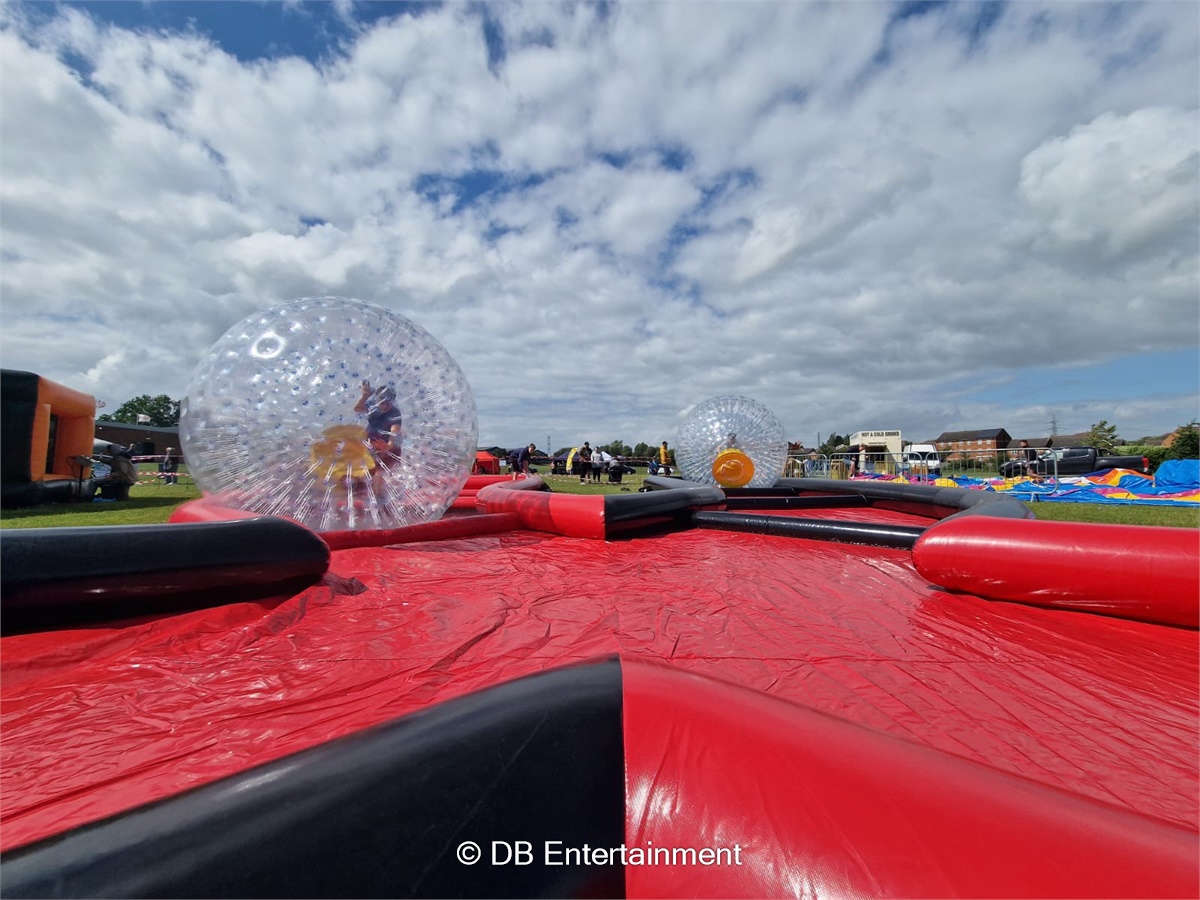 Zorbs with Kris Cross Track - Inflatable Funfair & Exhibition Game Hire ...