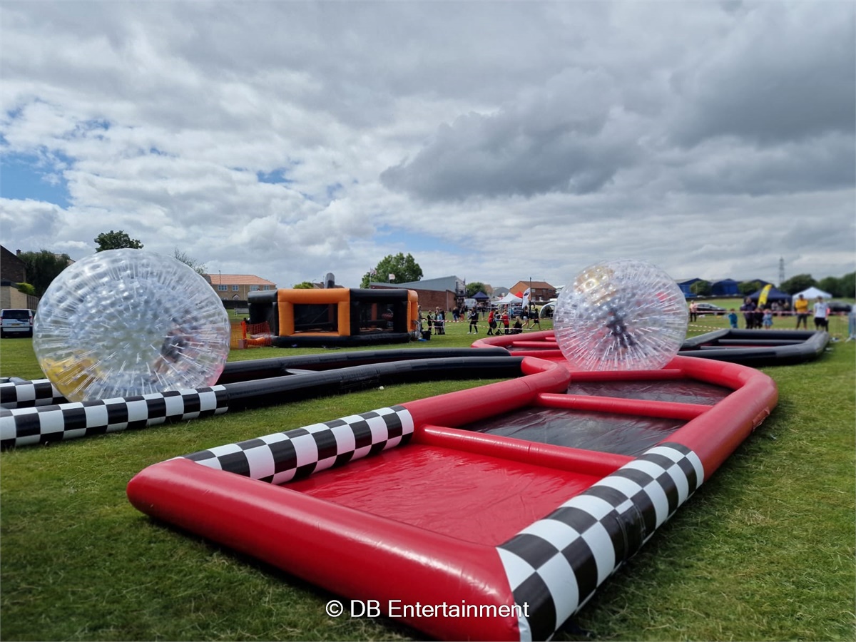 Zorbs with Kris Cross Track - Inflatable Funfair & Exhibition Game Hire ...
