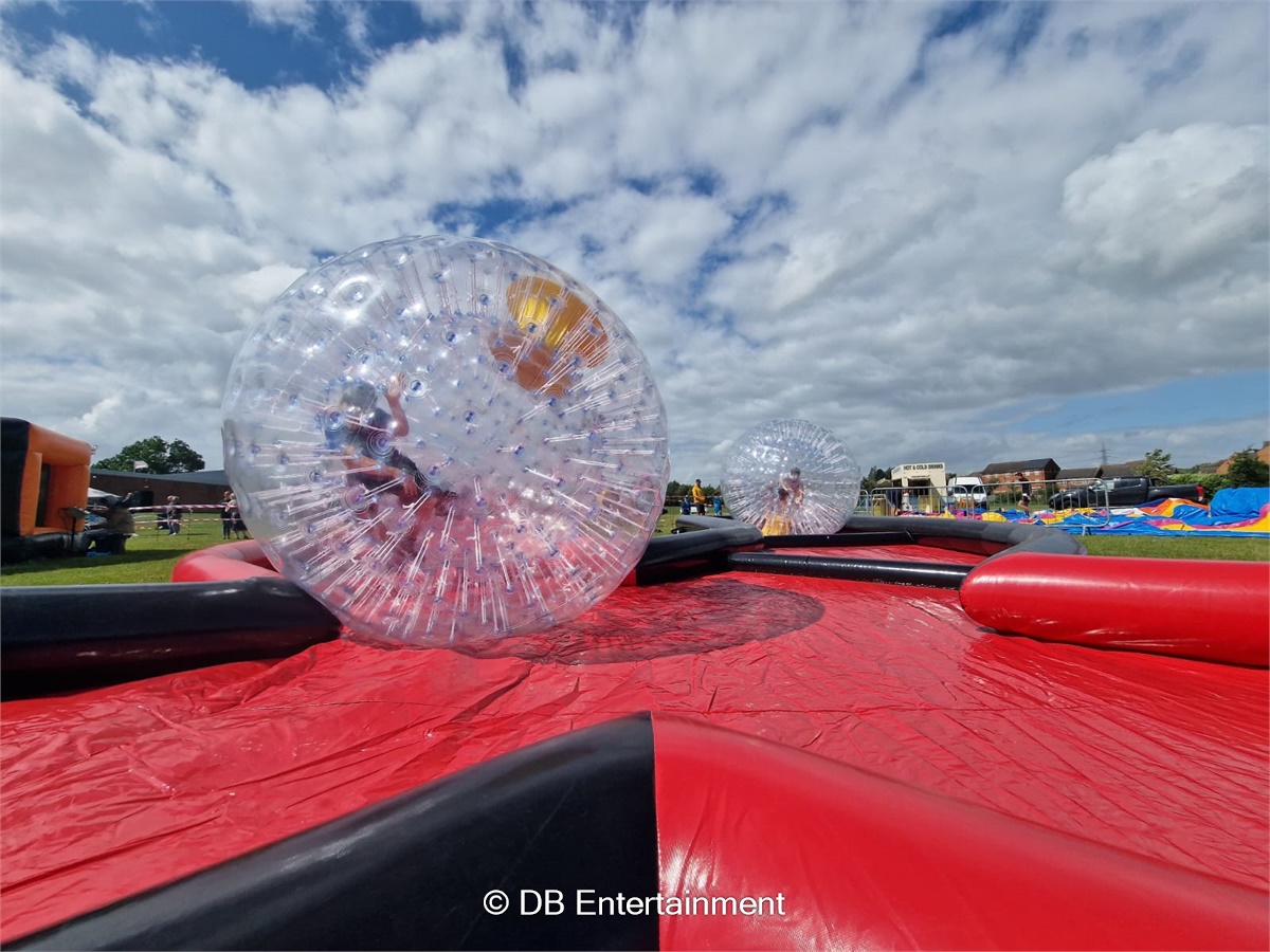 Zorbs with Kris Cross Track - Inflatable Funfair & Exhibition Game Hire ...